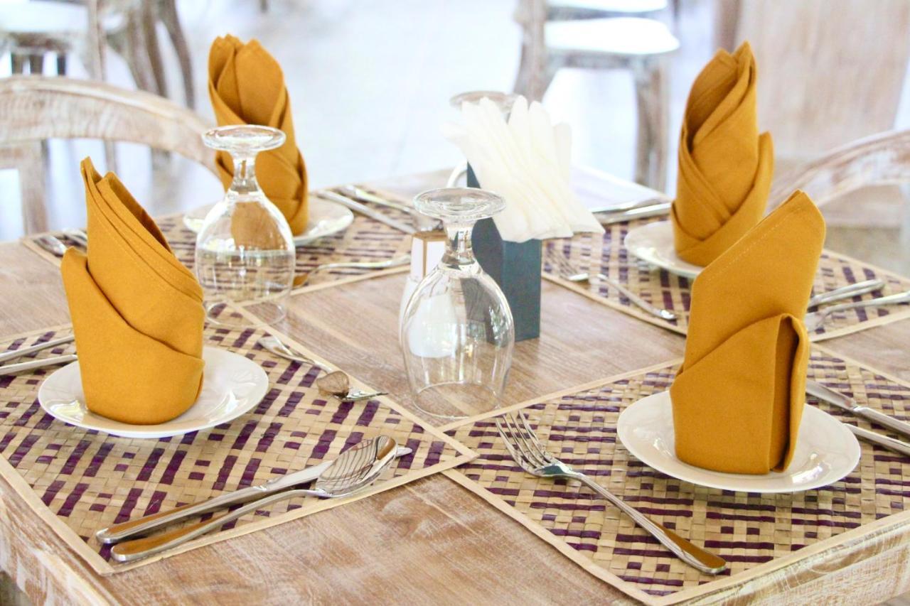 Nivadoo Resort Sigirîya Extérieur photo A table set for fine dining
