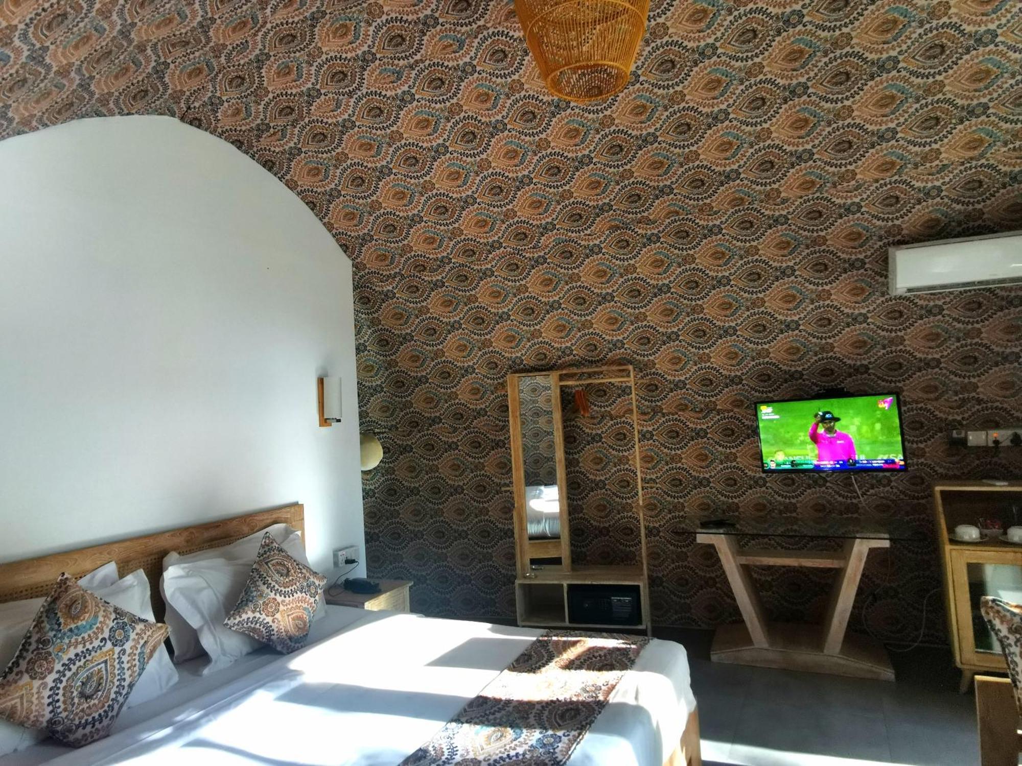 Nivadoo Resort Sigirîya Extérieur photo A room at the hotel