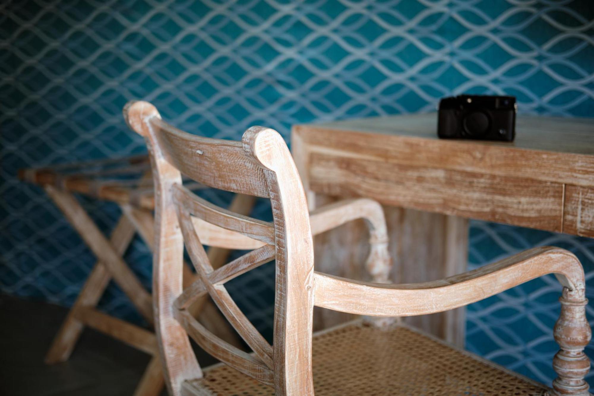 Nivadoo Resort Sigirîya Chambre photo A chair